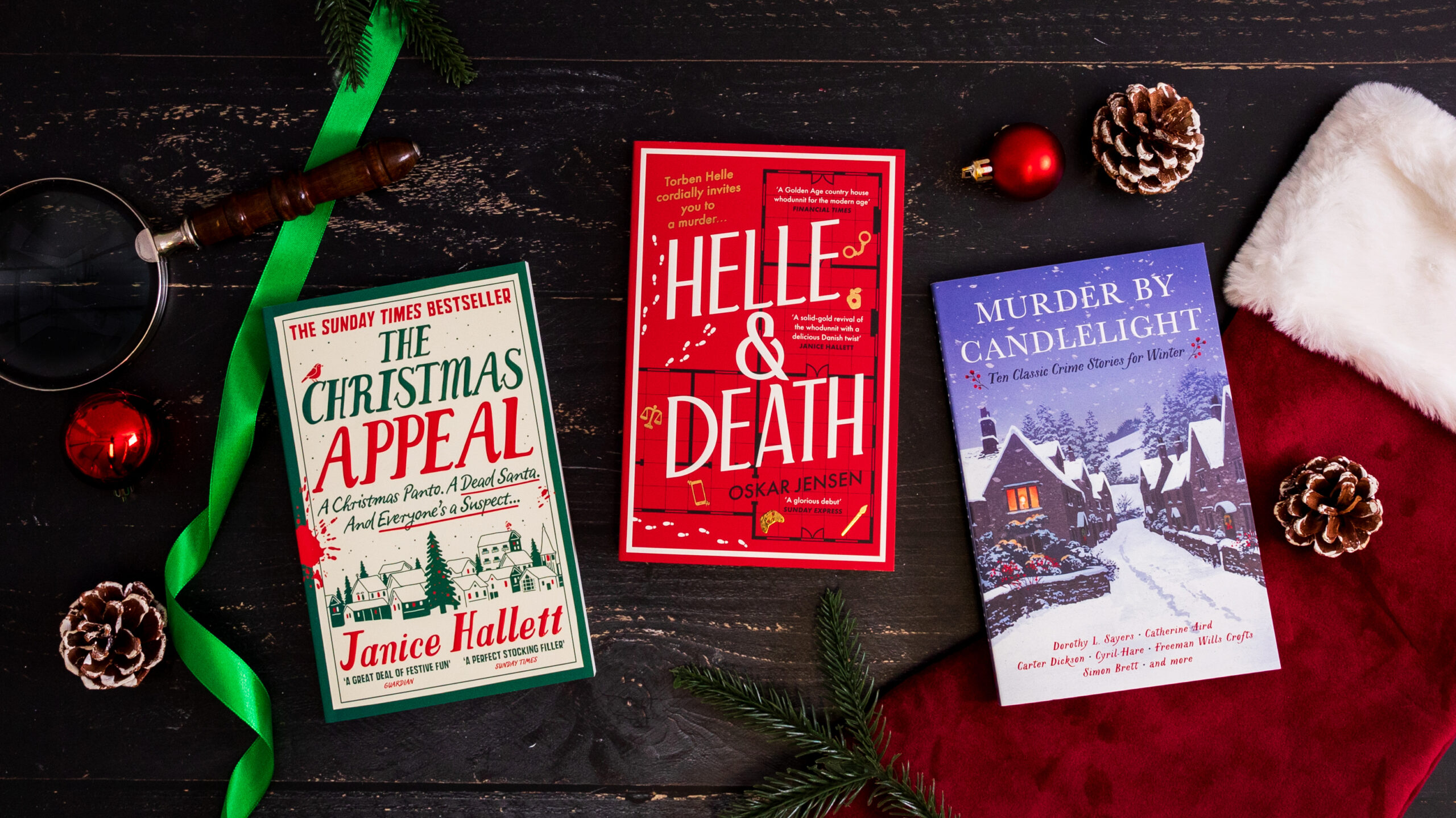 A top-down photograph featuring three Viper books with Christmas decorations surrounding them. The books are: The Christmas Appeal PBK, Helle and Death PBK, Murder by Candlelight.